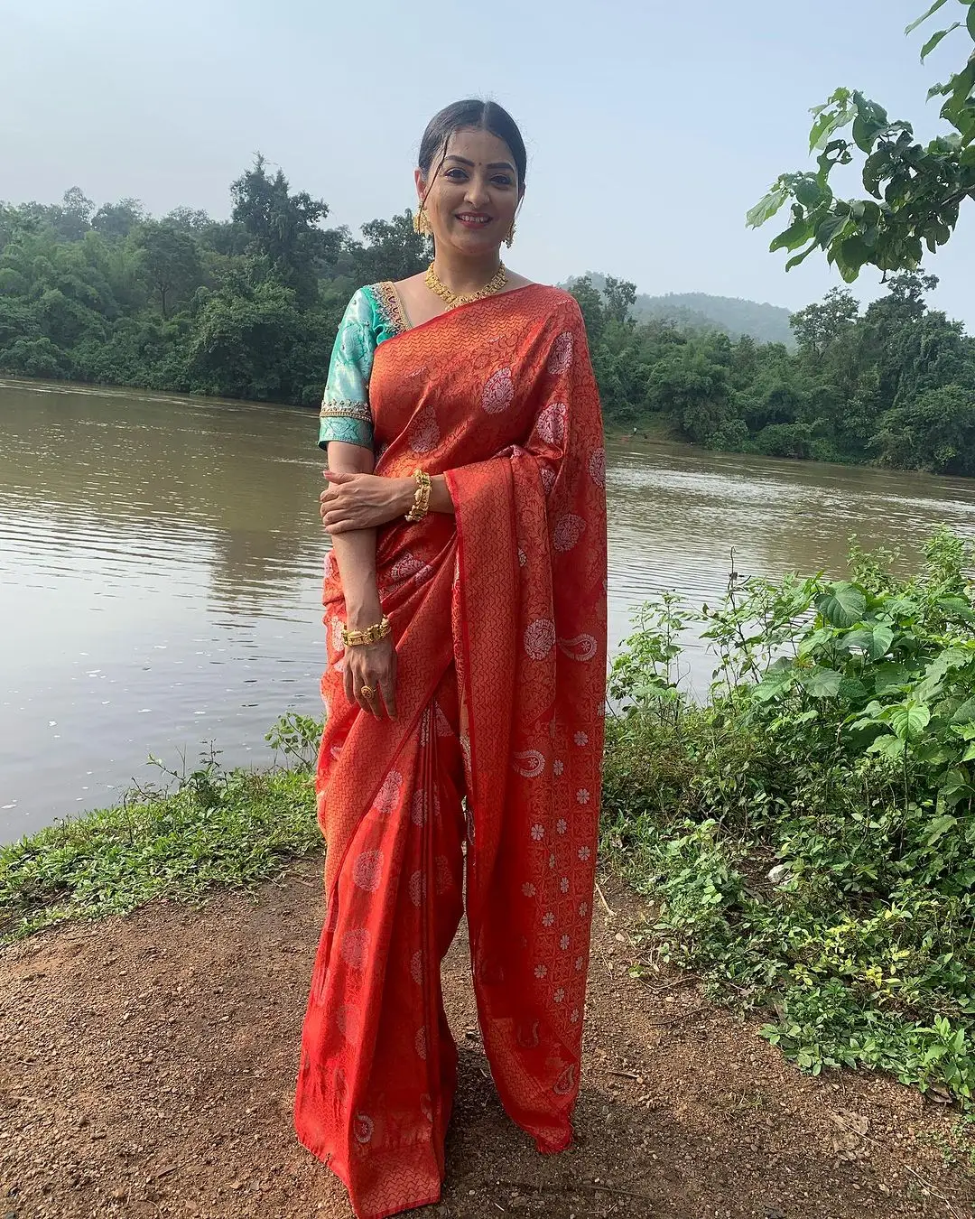 ETV Abhiruchi Madhuri Kandavalli In Traditional Orange Saree Blue Blouse